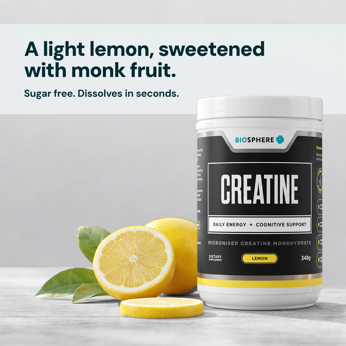 Biosphere Creatine Lemon tub beside fresh lemons
